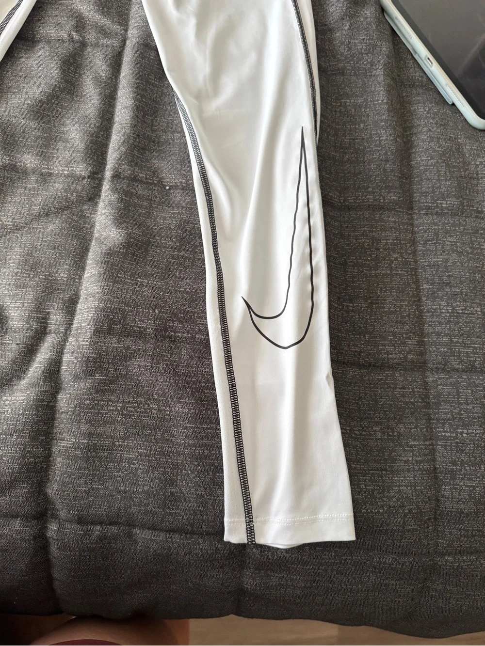 Nike White Compression Leggings with Black Waistband and Swoosh Detail